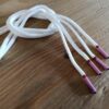 Paire de lacet blanc embouts rose