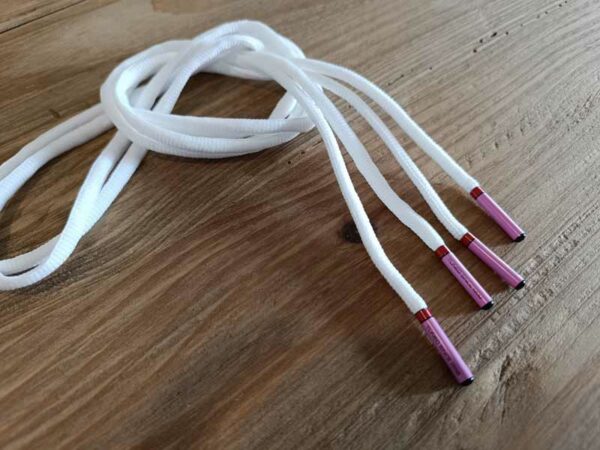 Paire de lacet blanc embouts rose