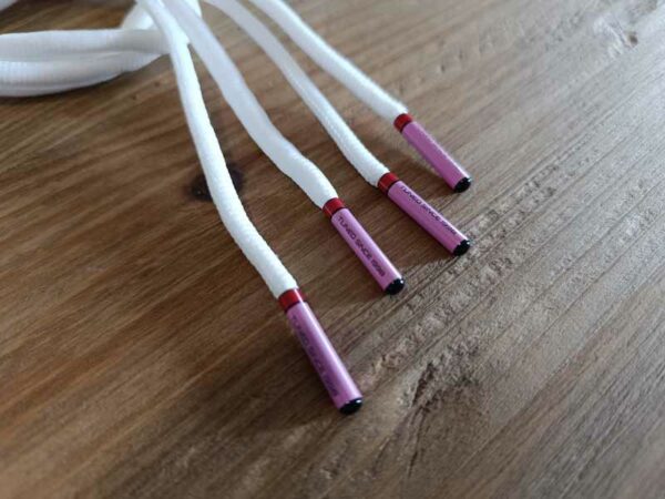 Paire de lacet blanc embouts rose