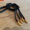 Paire de lacet noire embouts orange