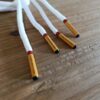 Paire de lacet blanc embouts orange