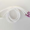 Paire de lacet blanc embouts rose