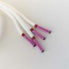 Paire de lacet blanc embouts rose