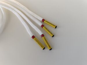 Paire de lacet blanc embouts jaune
