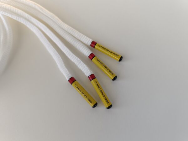 Paire de lacet blanc embouts jaune