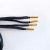 Paire de lacet noir embouts doré