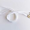 Paire de lacet blanc embouts doré