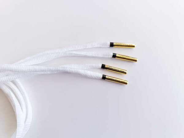 Paire de lacet blanc embouts doré