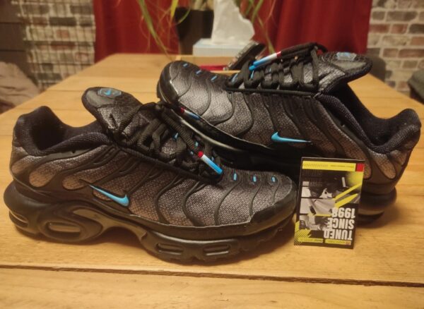 Paire de lacet noire embouts nation