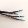 IMG_20250428_120343 Paire de lacet noire embouts Aqua-fade